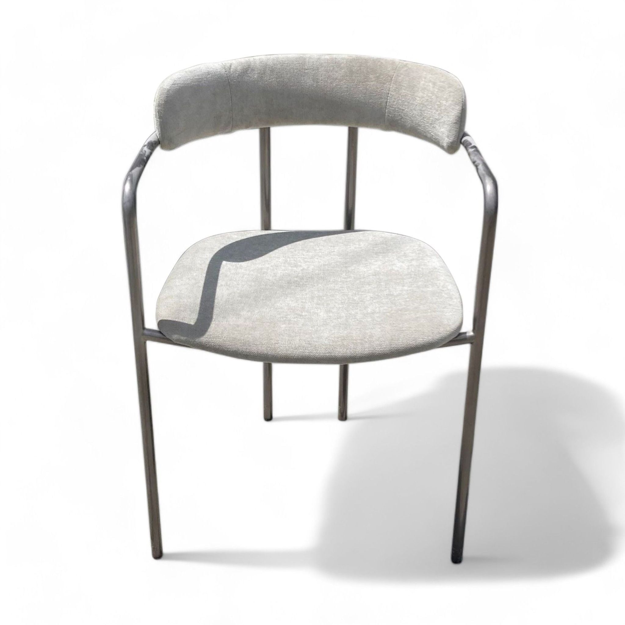 West Elm Lenox dining chair with curved steel frame and light grey upholstered seat and back, elegant design suitable for dining areas.