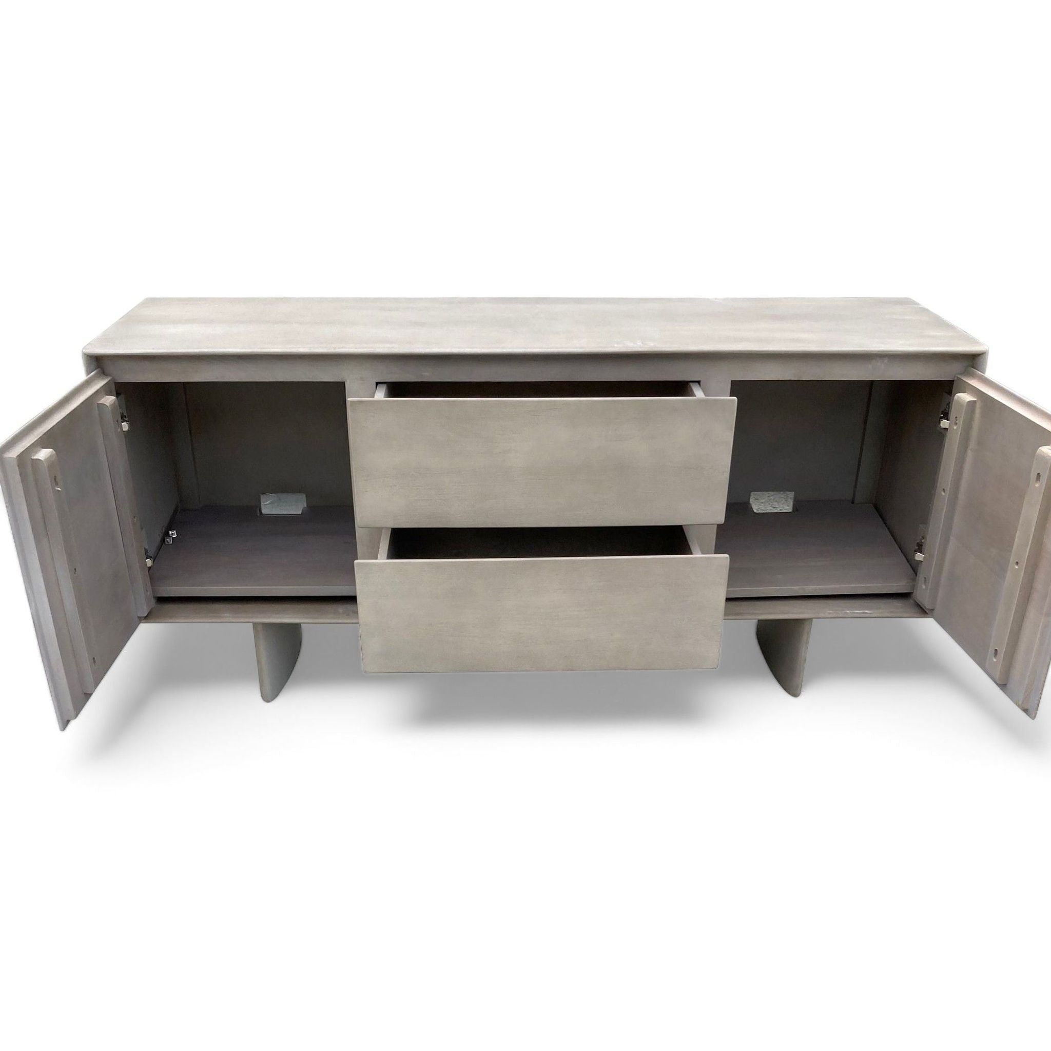 Alt text 2: Open mango wood buffet displaying its interior with shelves in the cabinets and two pull-out drawers, highlighting ample storage space, by Williams Sonoma.
