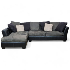 Image of Ashley Furniture Jacurso 2-Piece Sectional with Chaise in Charcoal