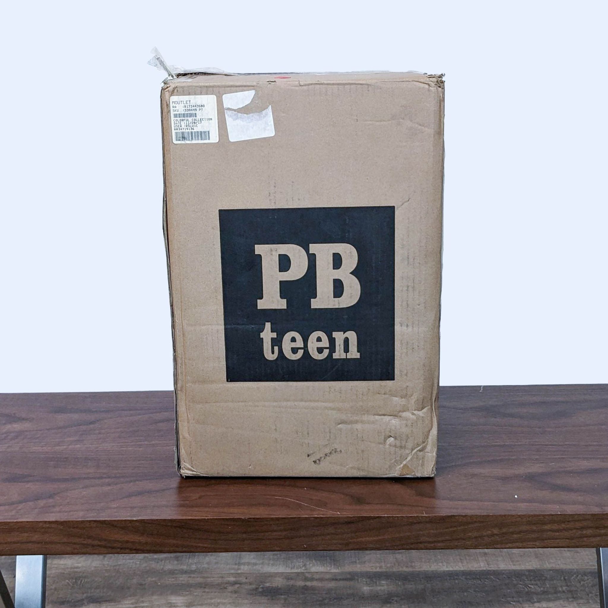 a box of pb teen on a table