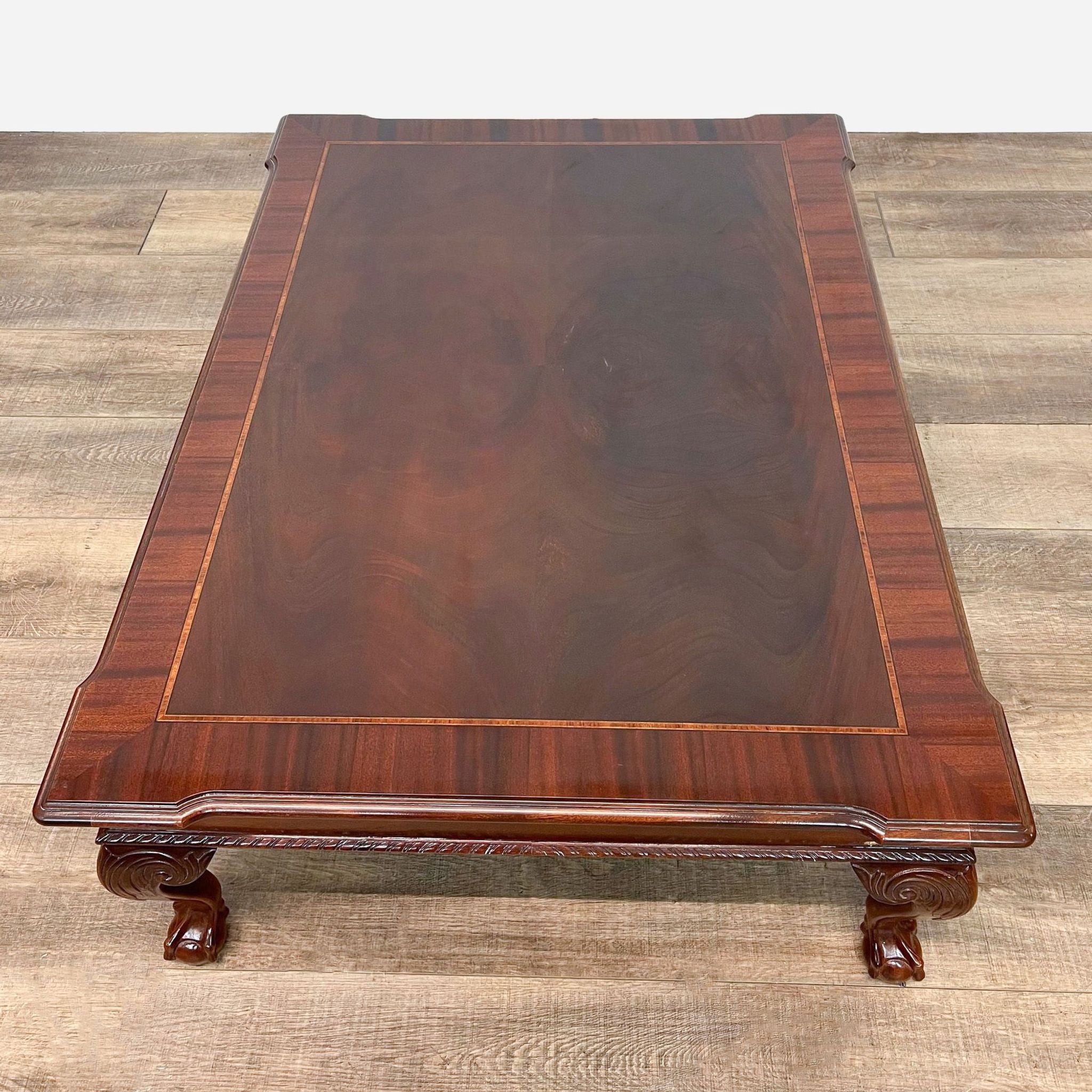 a fine antique mahogany coffee table with a beautiful patina.