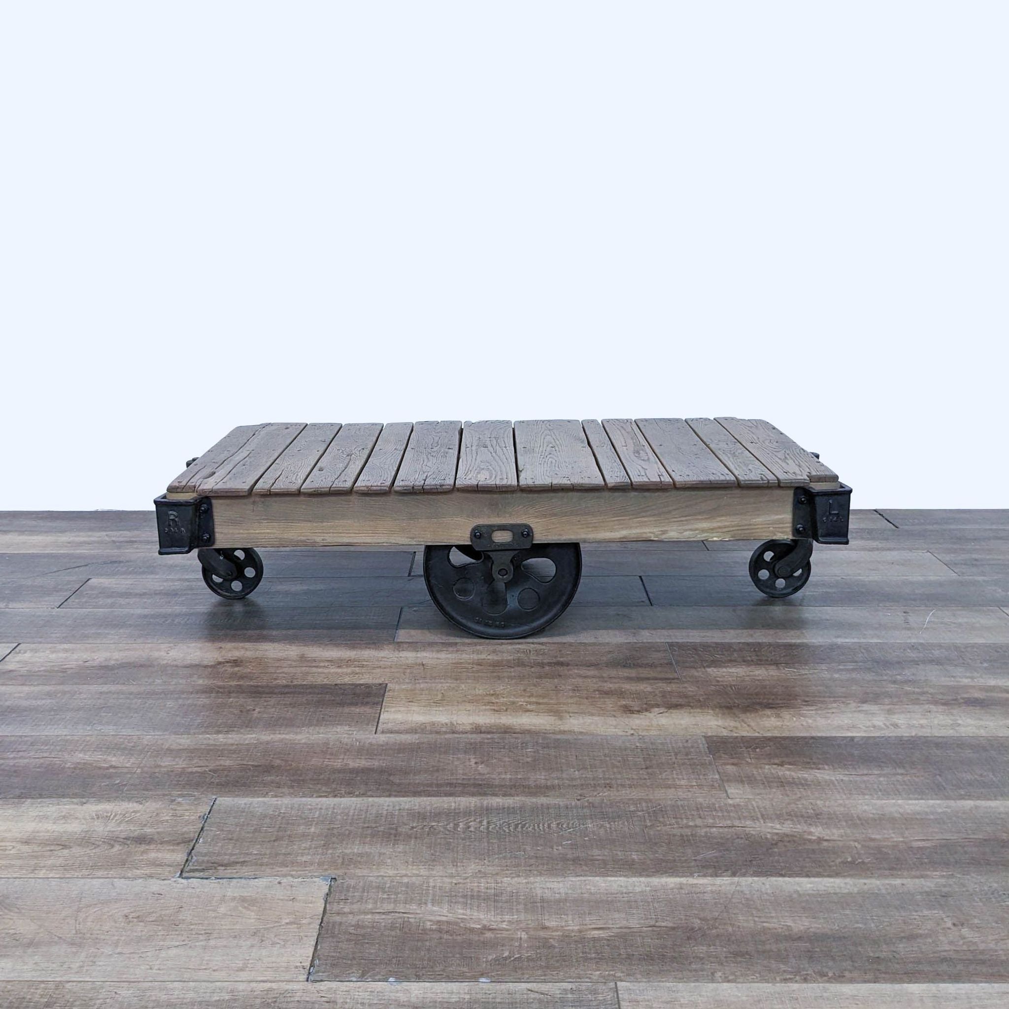 a cart with a wooden top and a wooden top.