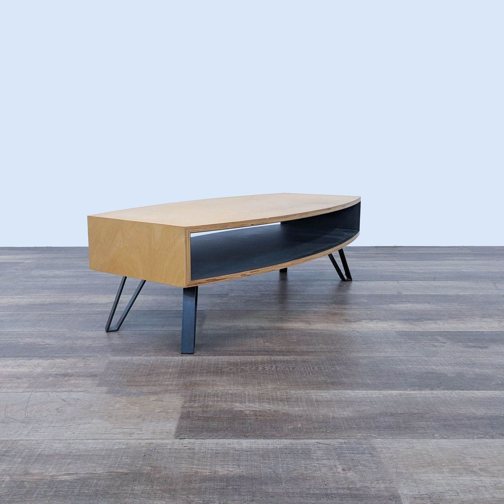 the coffee table is a modern coffee table with a modern design.