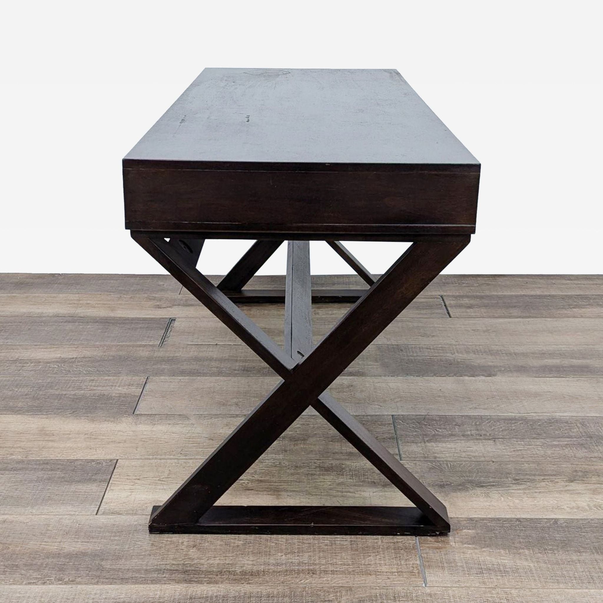 a small square table with a square base.