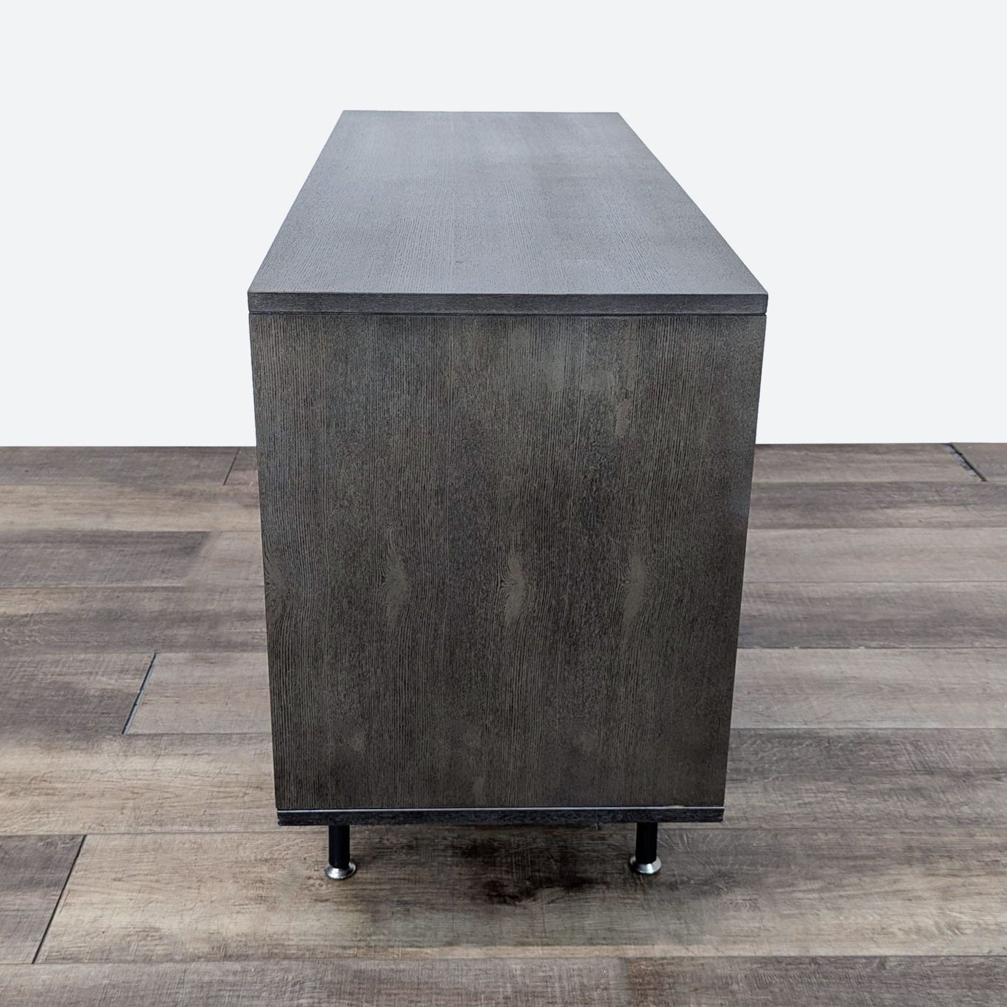 the side table is made from a steel and wood veneer.