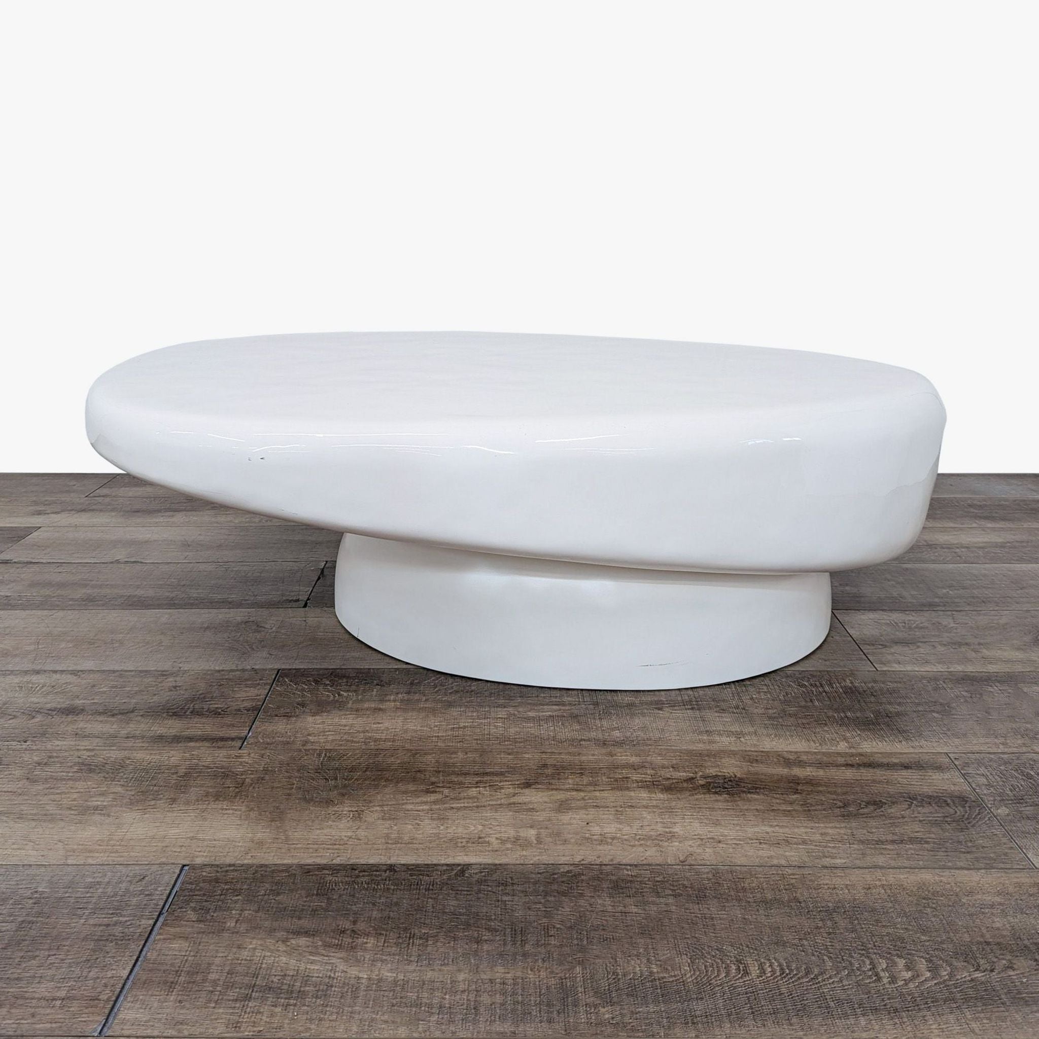 the curated nomad arkin modern oval coffee table