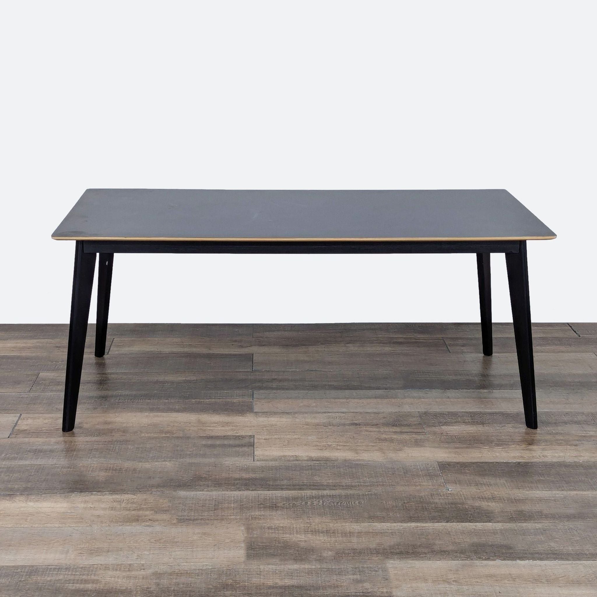 a wooden table with a wooden floor 