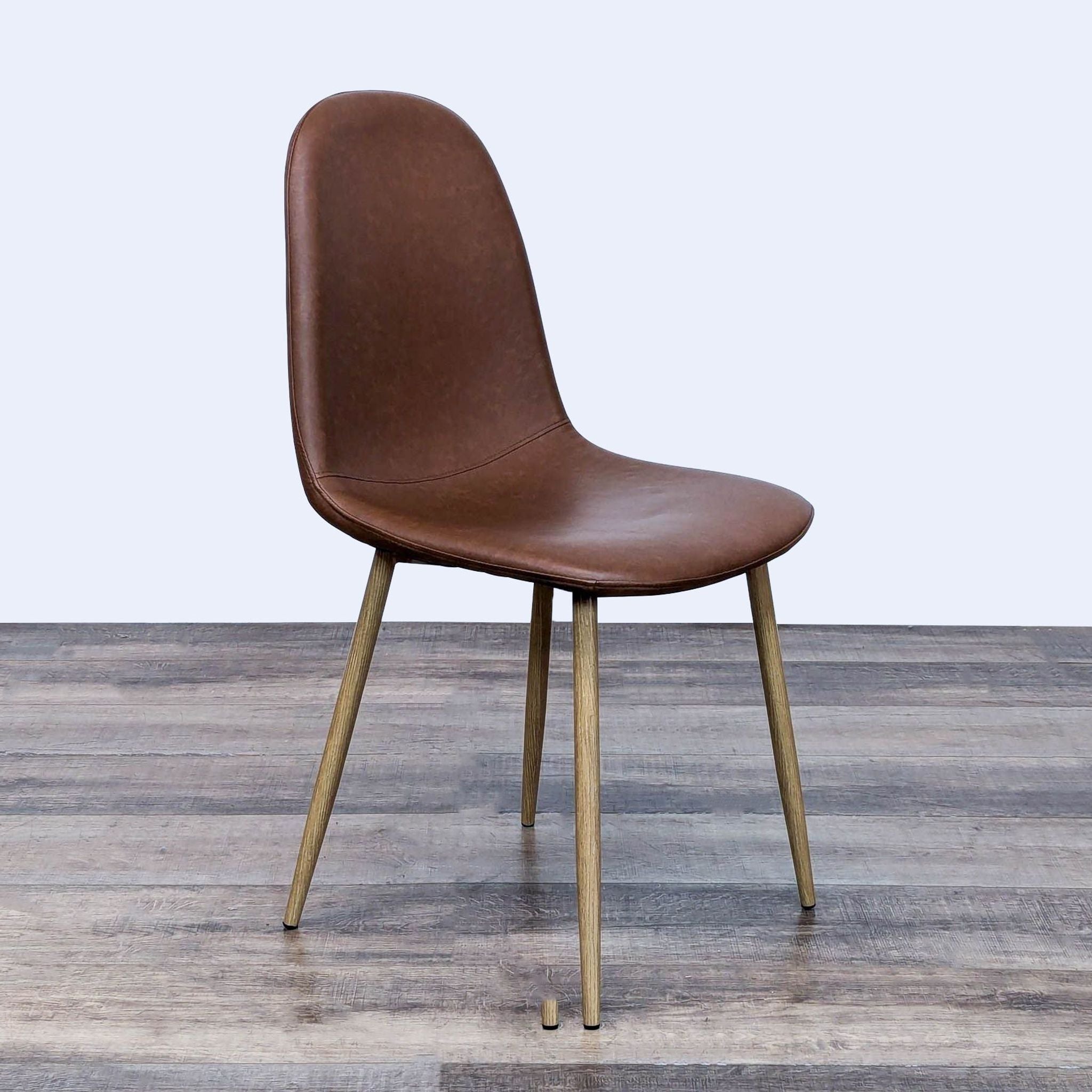 a chair with a wooden seat and a wooden floor 