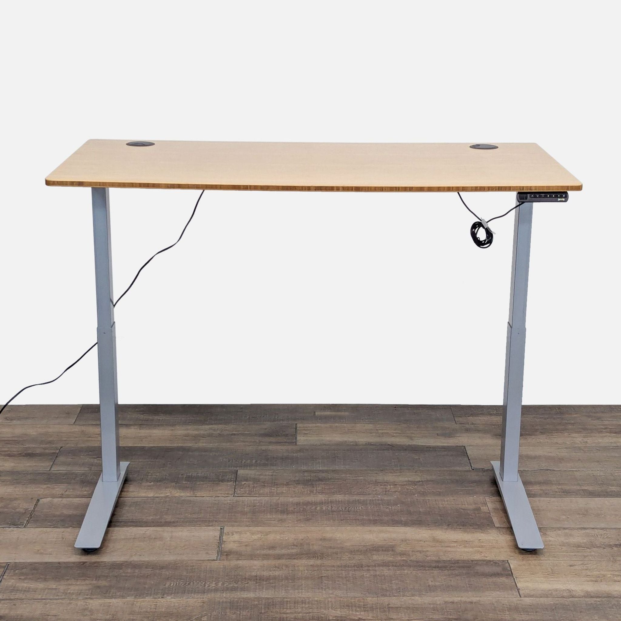 Front view of Jarvis standing desk with a wooden top.  