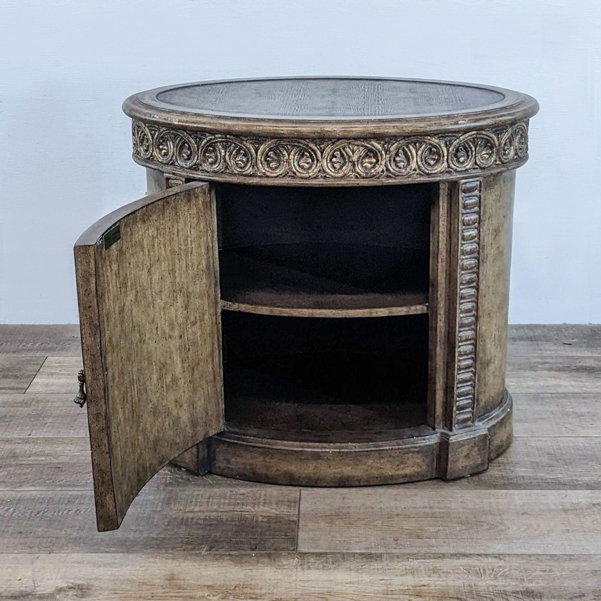 Pair of The Platt Collection end tables with a distressed finish, showcasing carved details and craftsmanship.