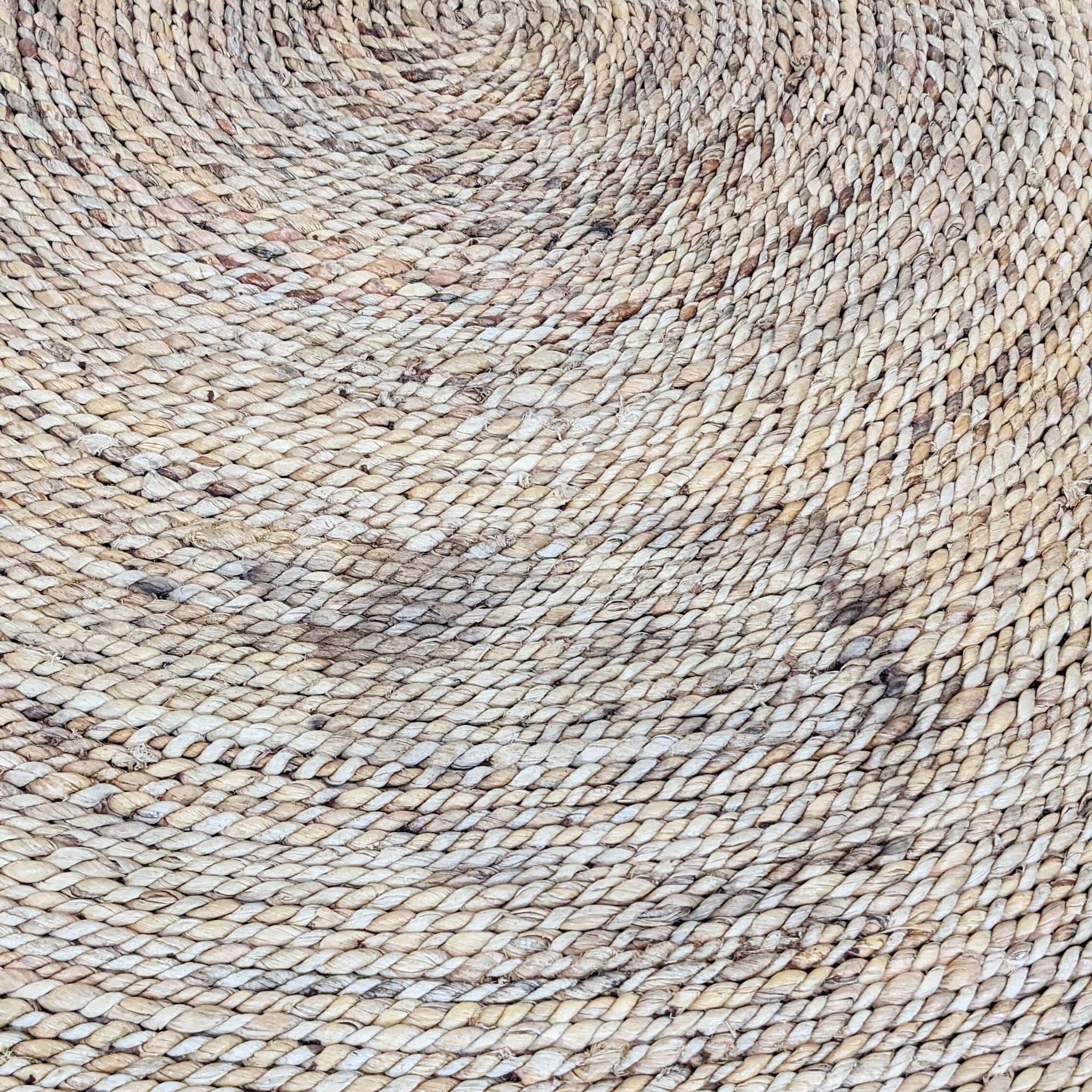 Close-up texture of natural fiber woven surface on Reperch coffee table.
