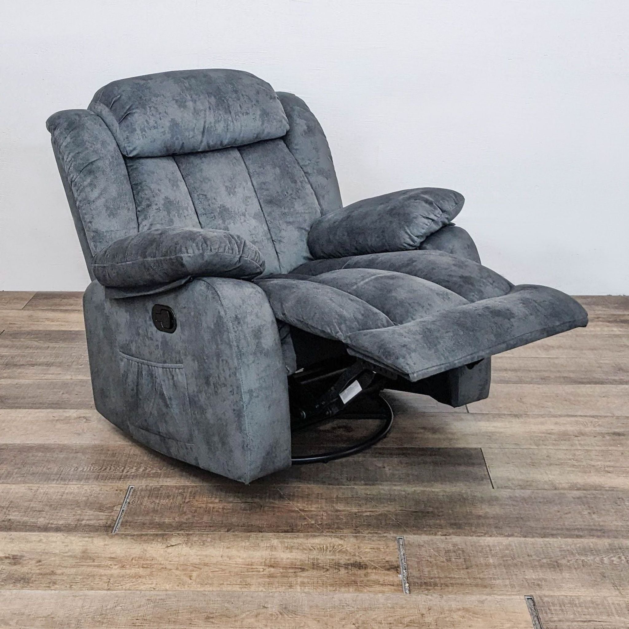 Reclined Latitude Run Heated Massage Chair with visible remote, highlighting multiple heat and massage settings.