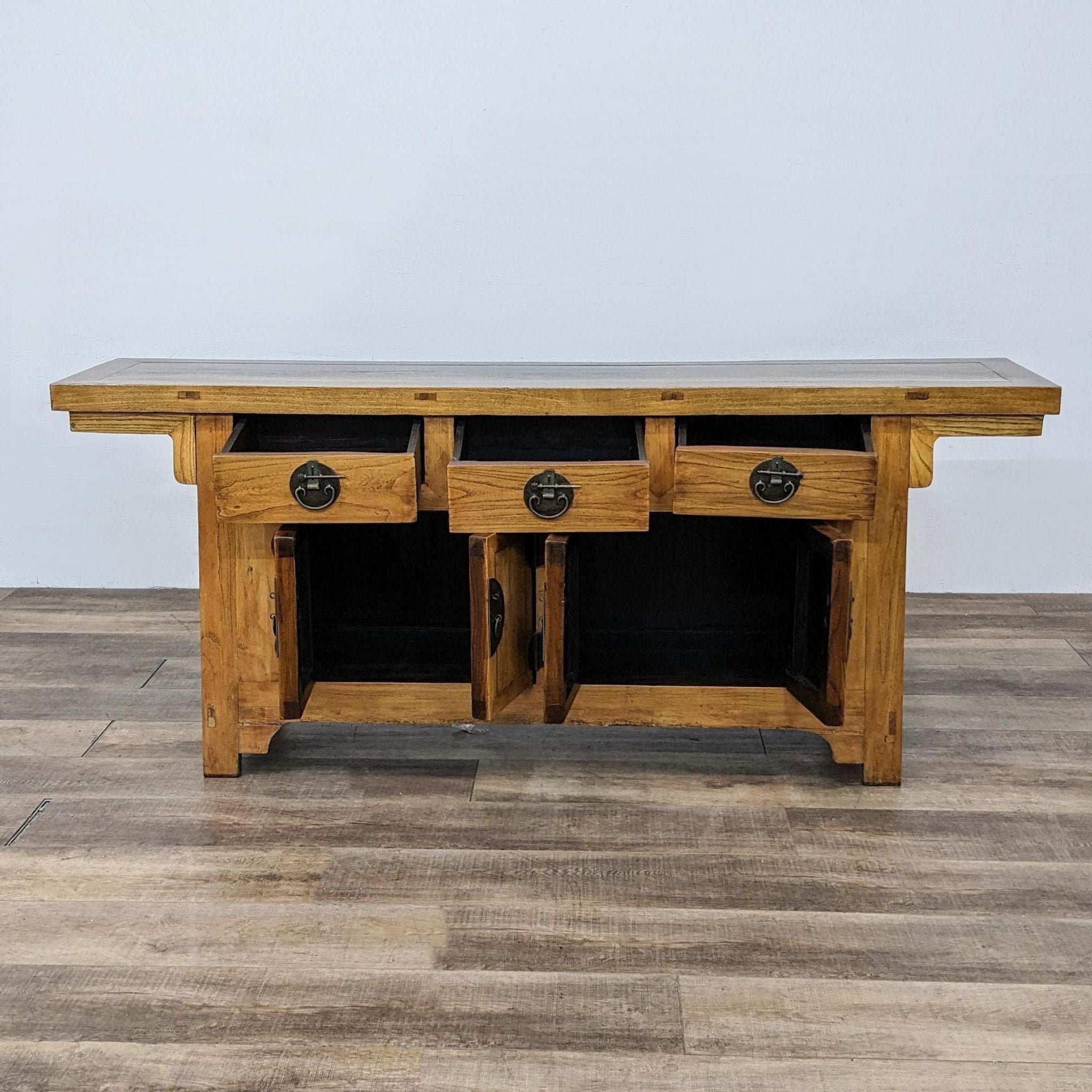 Second image: Wooden credenza with open shelves, iron details from GaulSearson Ltd, visible in a front-facing view.