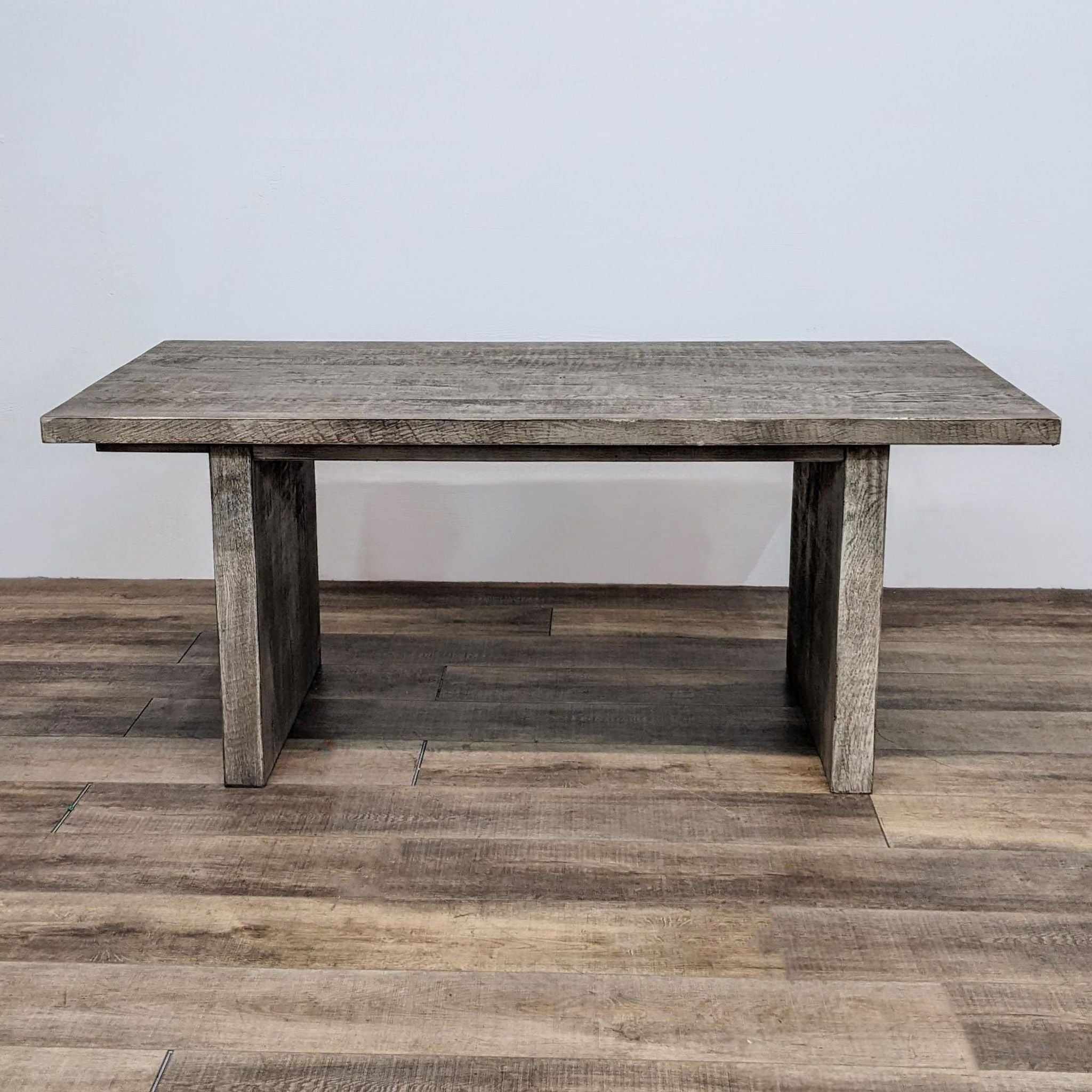 1. Rectangular Restoration Hardware dining table made from reclaimed oak with a distressed finish.