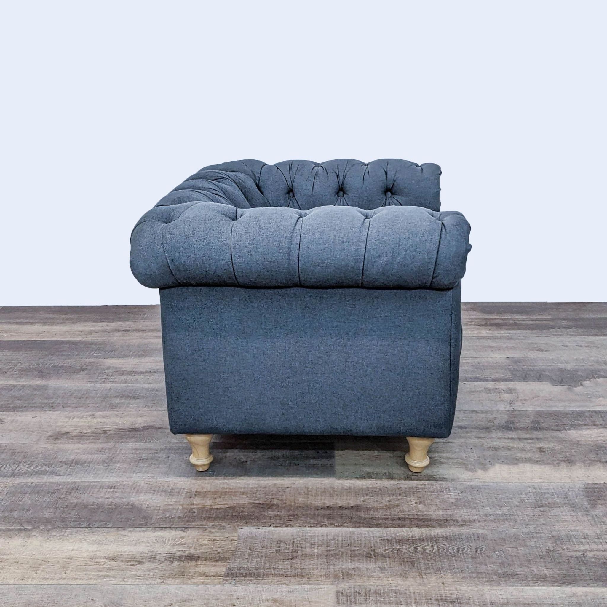 Tufted fabric lounge chair by World Market with rolled arms, displayed from various angles on hardwood floor.