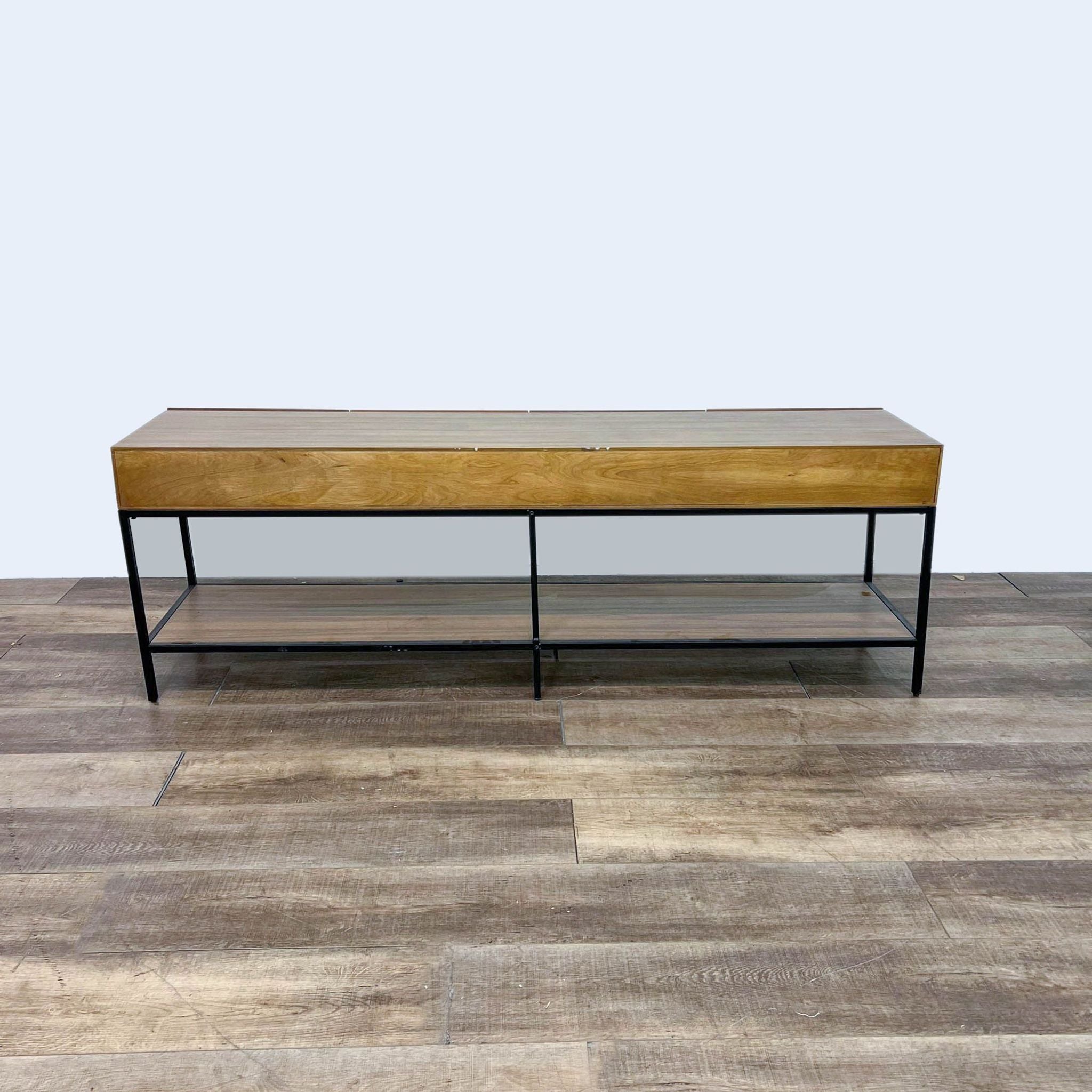 ROC brand sideboard with a metal base and light wood finish, featuring two drawers and a lower shelf, positioned on a wooden floor.