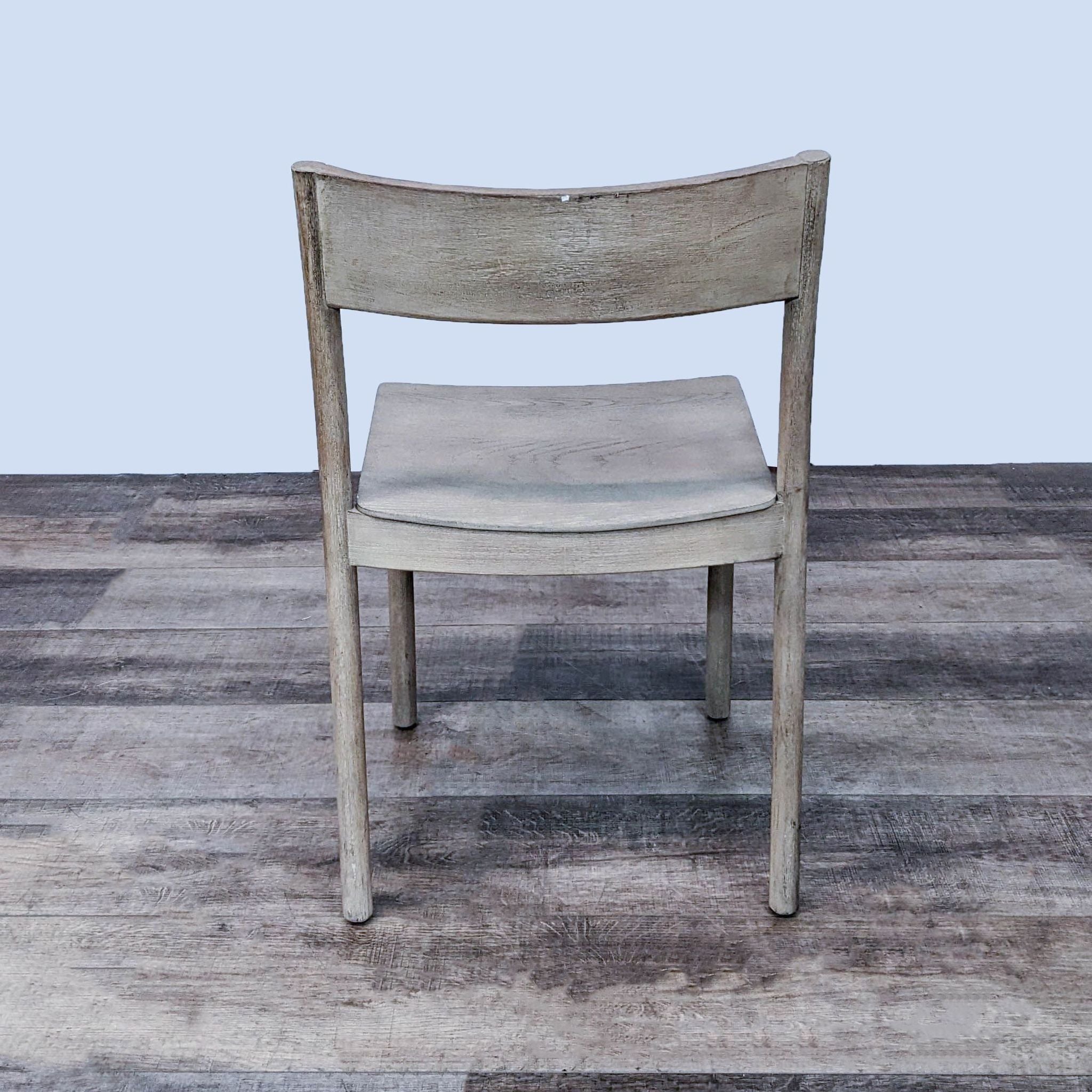 West Elm Berkshire chair with Dune finish on wooden floor.