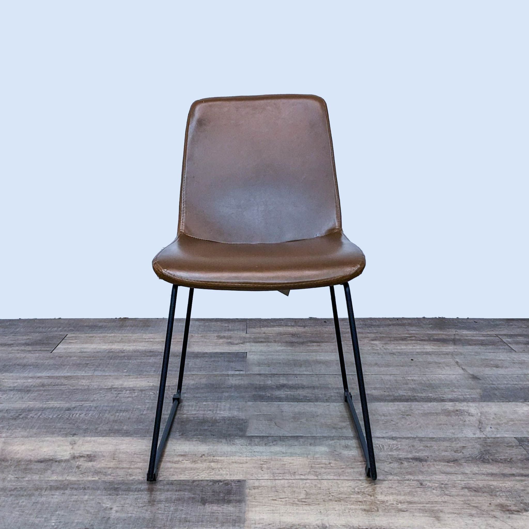 Alt text 1: Modway Invite dining side chair with brown faux leather and a black steel sled base on a wooden floor.