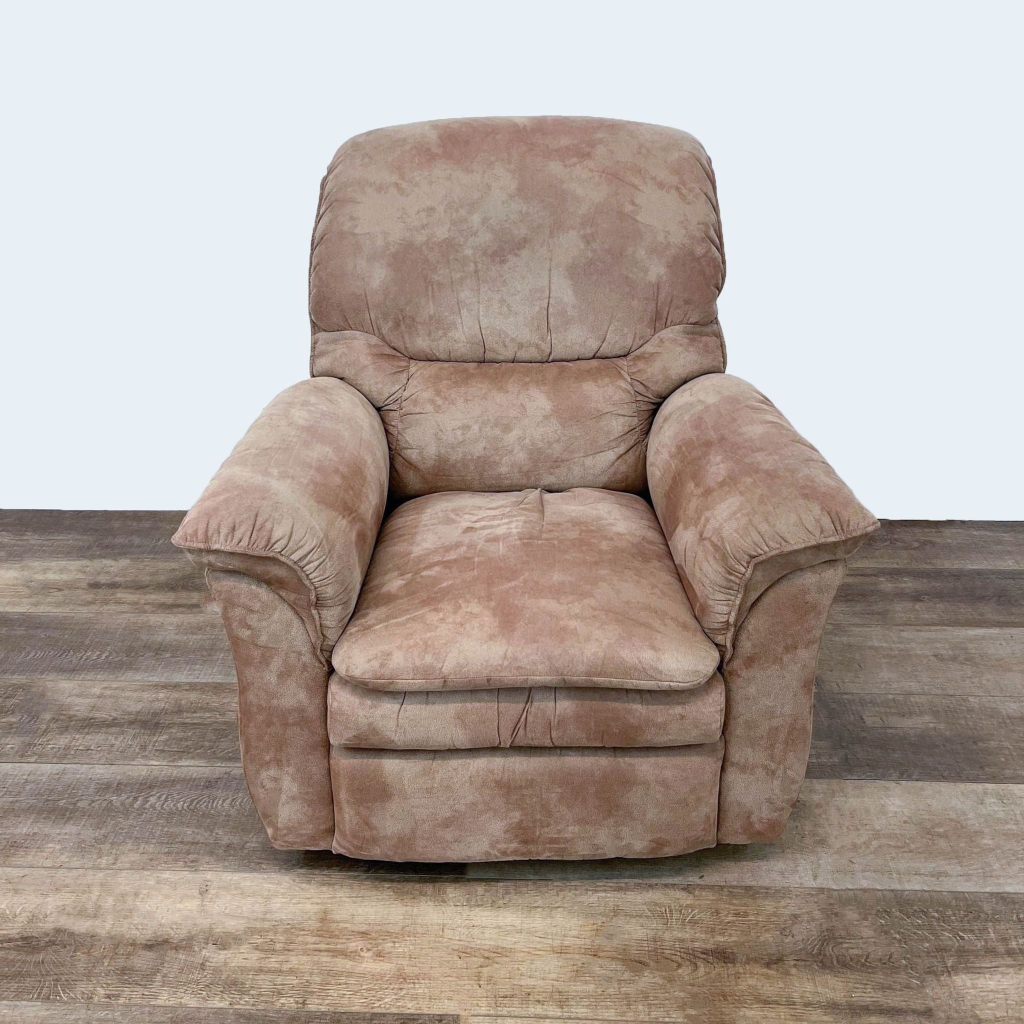 La-Z-Boy Trevor recliner with plush seating and pillow top arms, in upright position on a wooden floor.