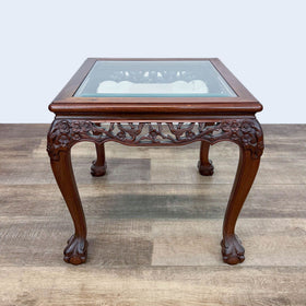 Image of Glass Top Carved End Table