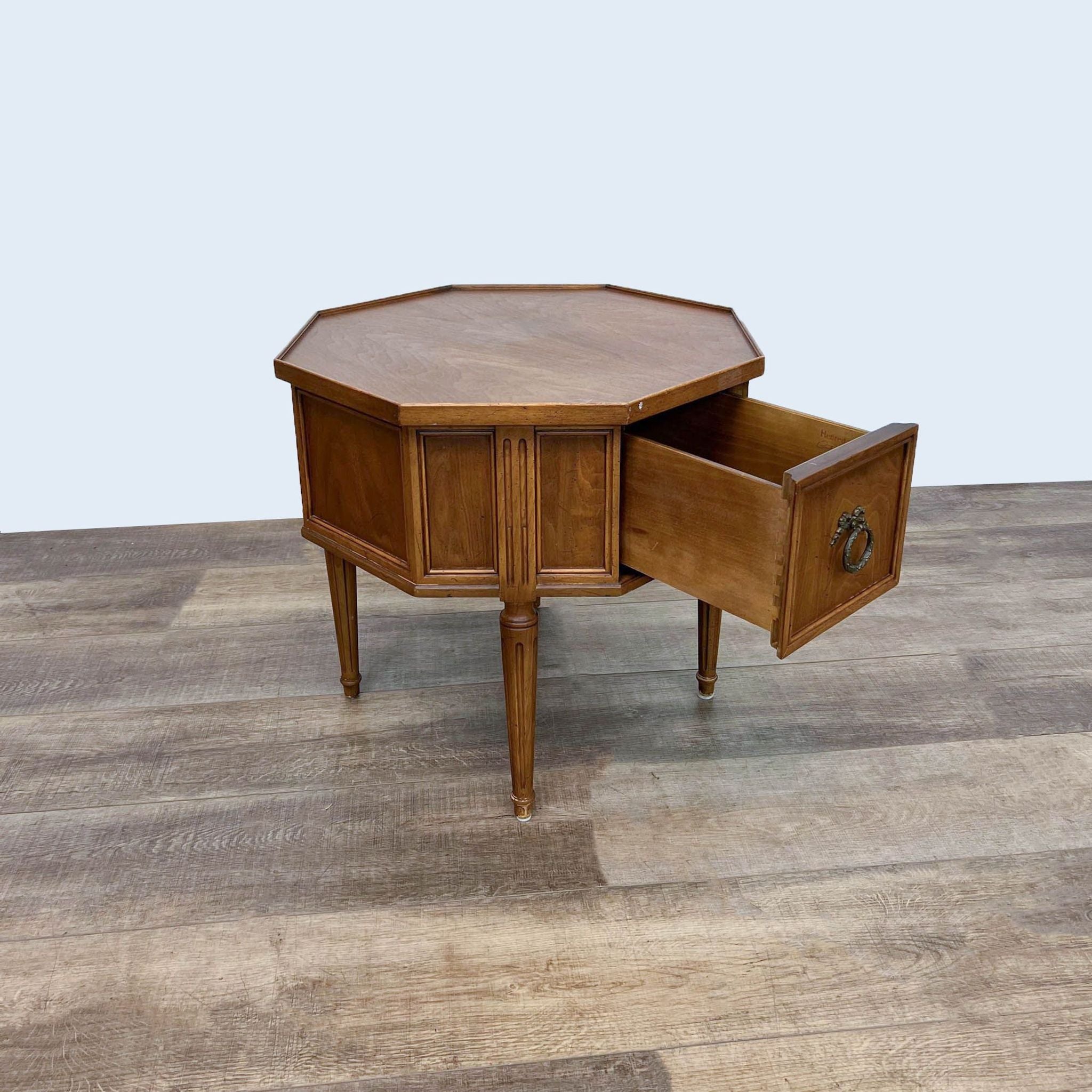 Reperch brand octagonal end table with an open drawer revealing storage space, made of wood with antique-style hardware.