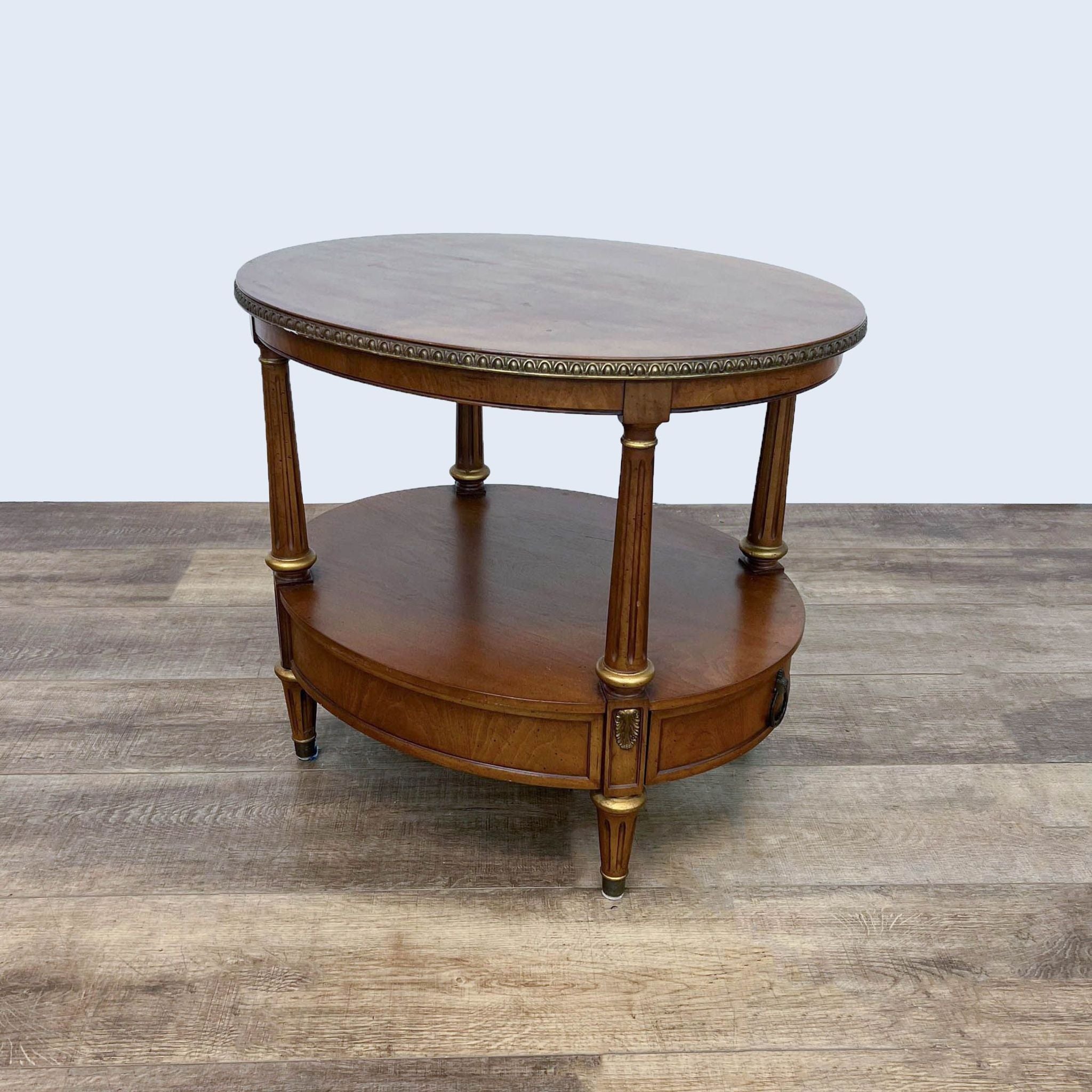 Henredon end table with fluted legs and one drawer, showcasing ornate edge detailing and a lower shelf.