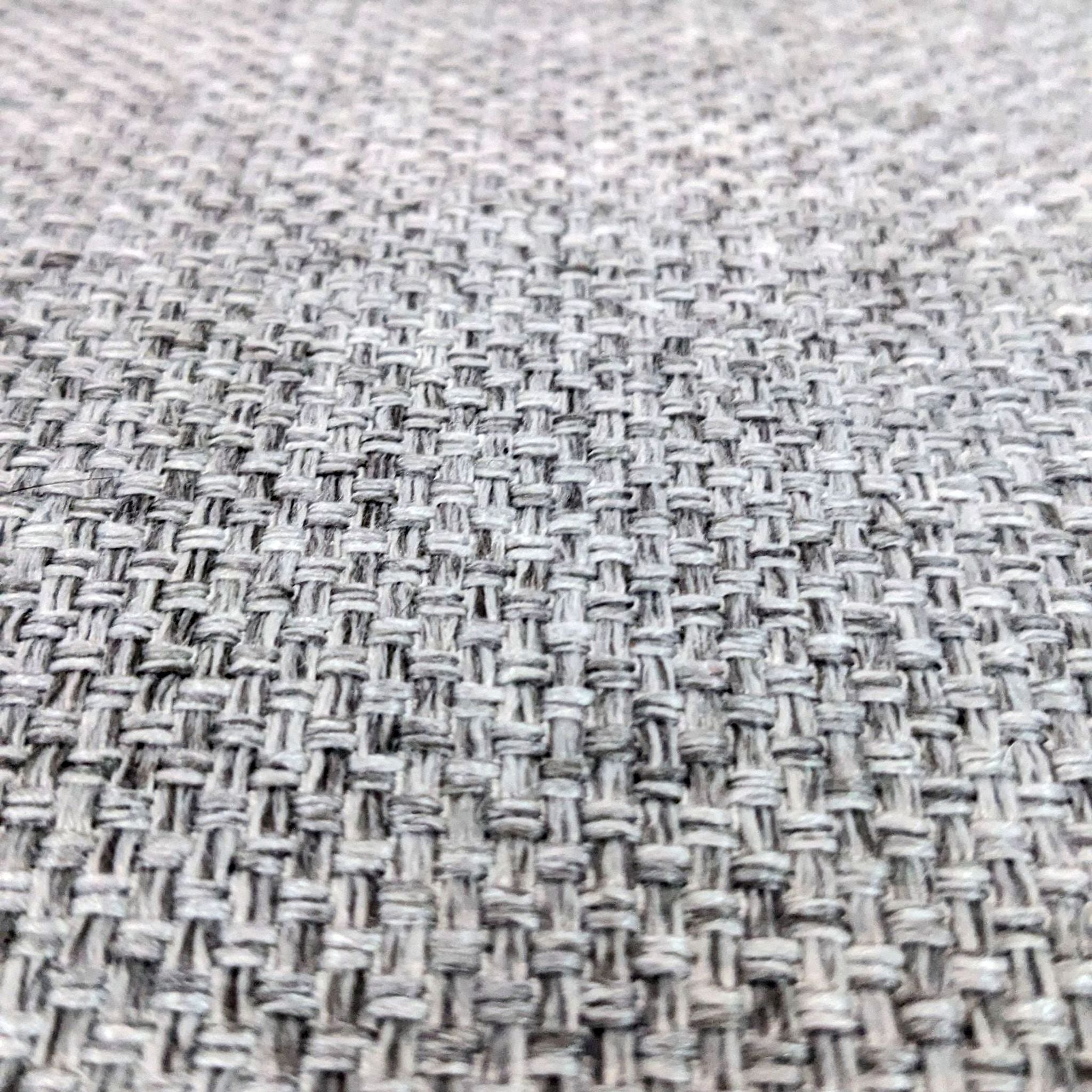 Close-up texture of the Four Hands Marlow chair fabric in a woven pattern.
