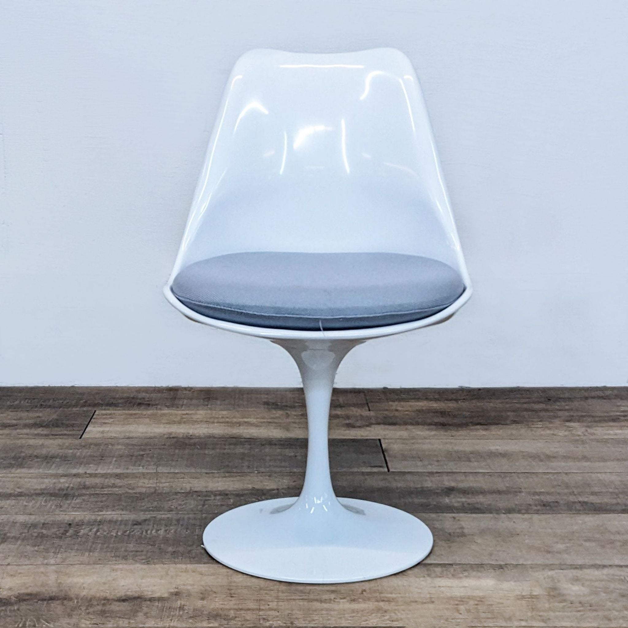 Modway Lippa dining chair with swivel tulip base and ergonomic white seat with gray cushion.