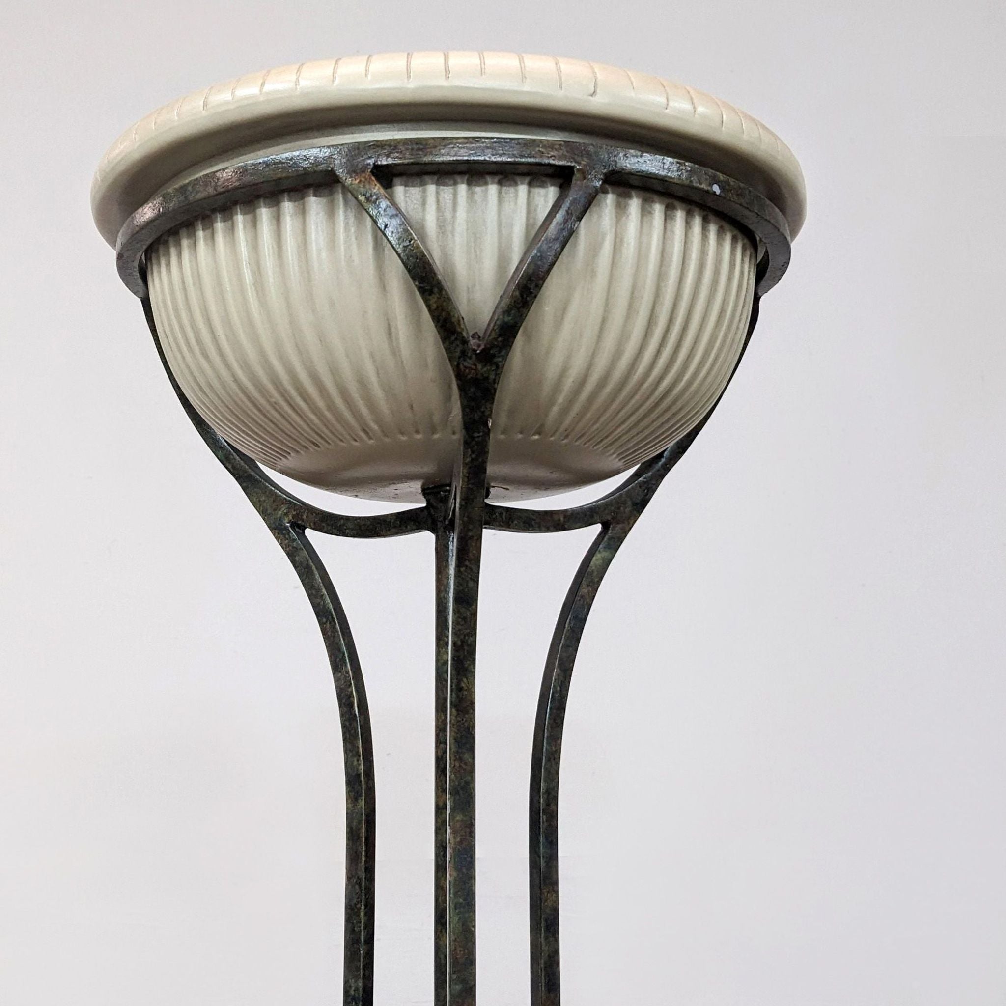 Alt text 2: Close-up of Reperch floor lamp head showing detailed iron frame and textured glass lampshade.