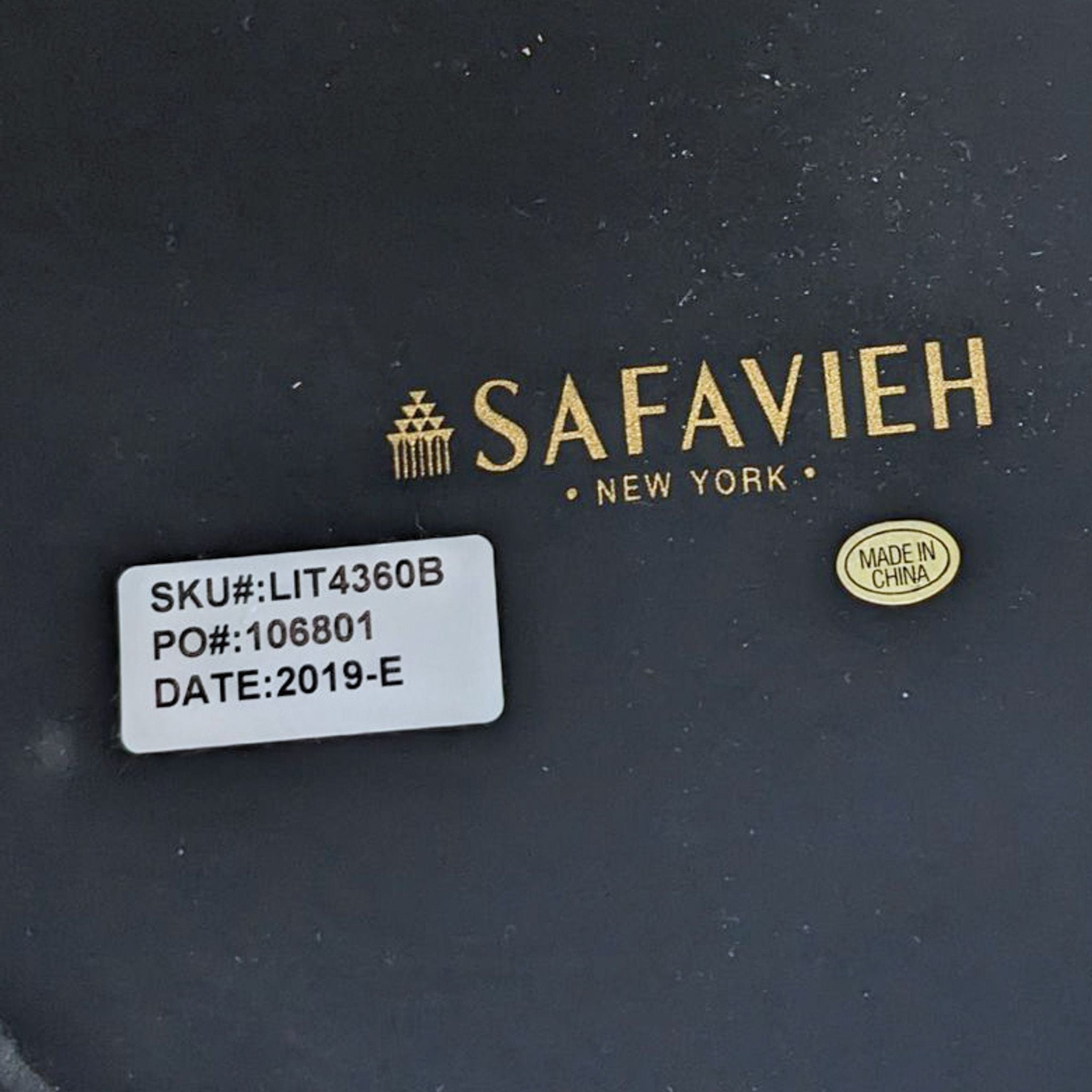 Alt text 2: Close-up of a Safavieh lamp's underside label showing SKU, PO number, and "Made in China" badge.