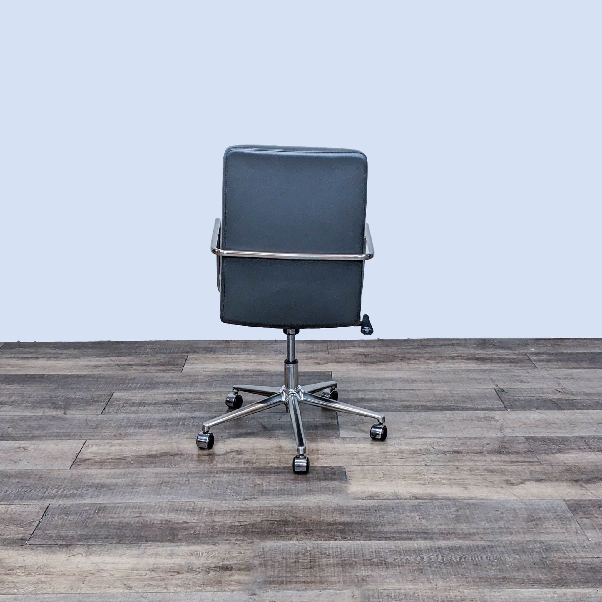 Finesse Office Chair by Modway with vinyl mid back, waterfall seat, chrome steel armrests, and multi-wheel aluminum base.