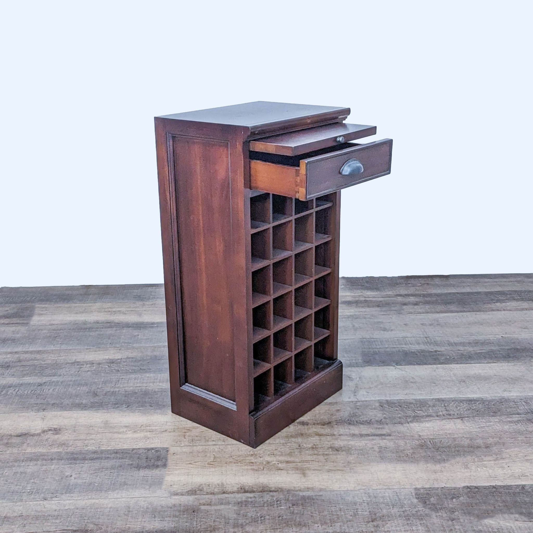Brown wine rack with pull-out tray and storage drawer brand Pottery Barn, viewed from a side angle.