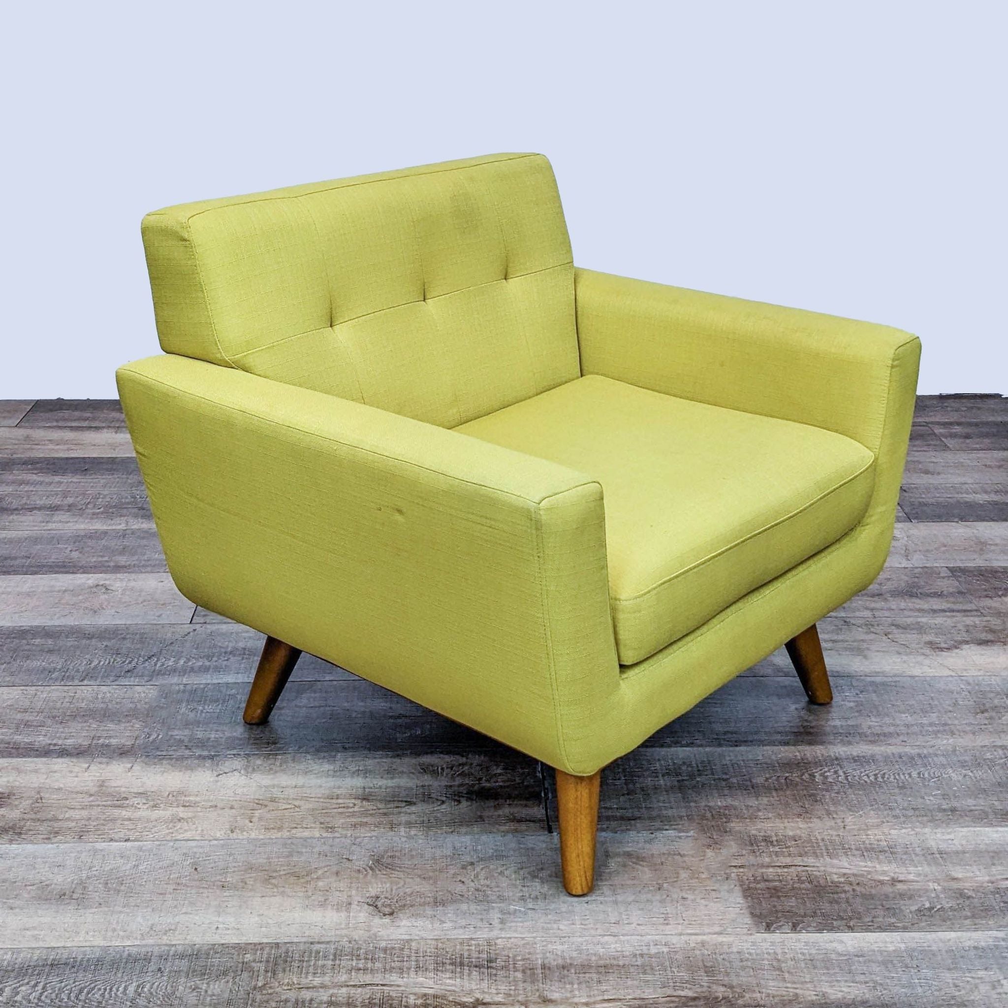 "Modway Engage chair with button tufting, mid-century modern design, in lime green, with tapered wood legs on a wooden floor."