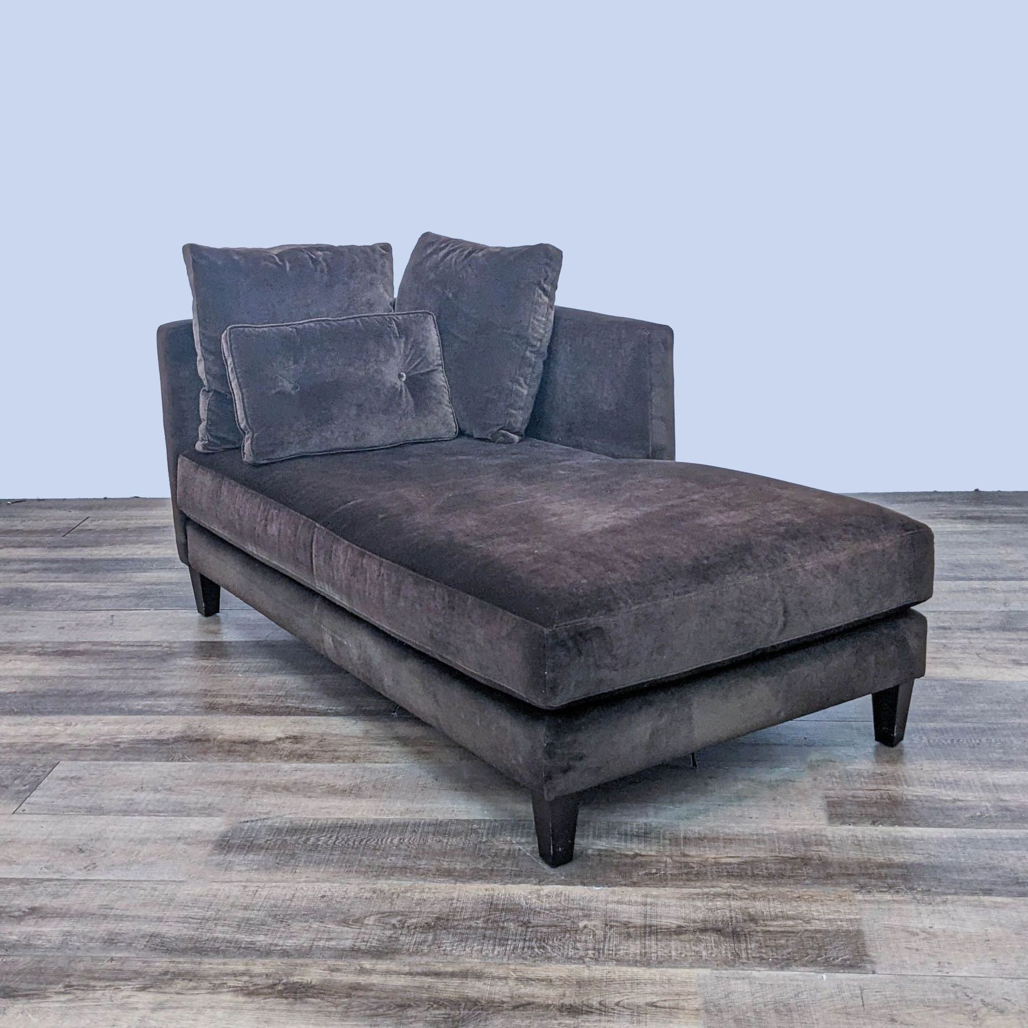 Crate & Barrel modern chaise with plush brown fabric, right-facing arm bench, and elegant dark wooden legs.