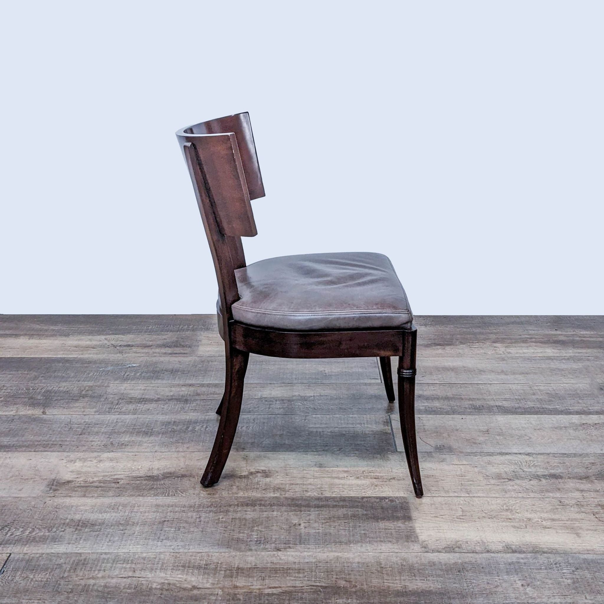Wooden dining chair from Williams Sonoma Home, featuring a scoop back and leather upholstery.
