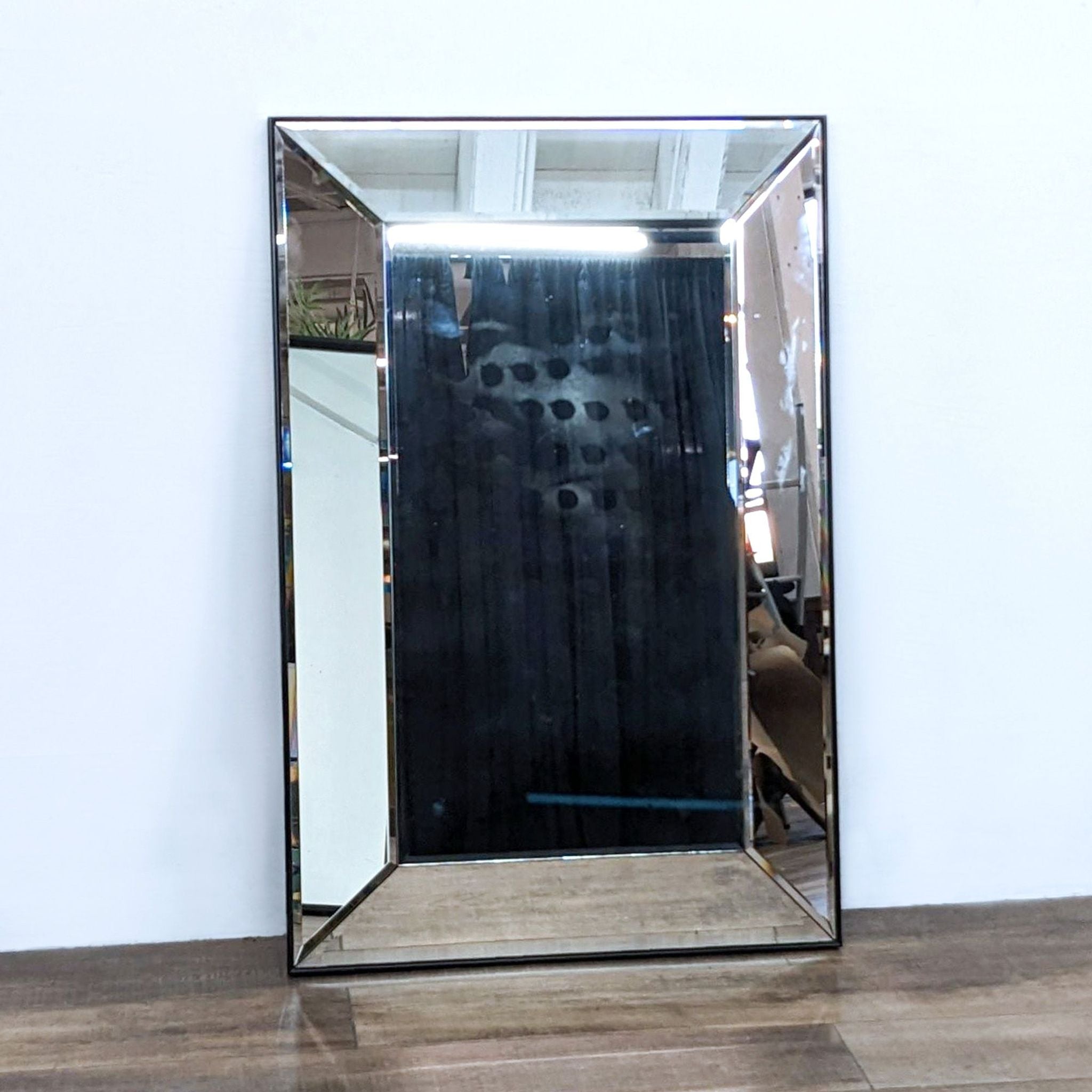 Alt text 1: Williams Sonoma Home rectangular mirror with beveled mirrored frame, reflecting an interior space.