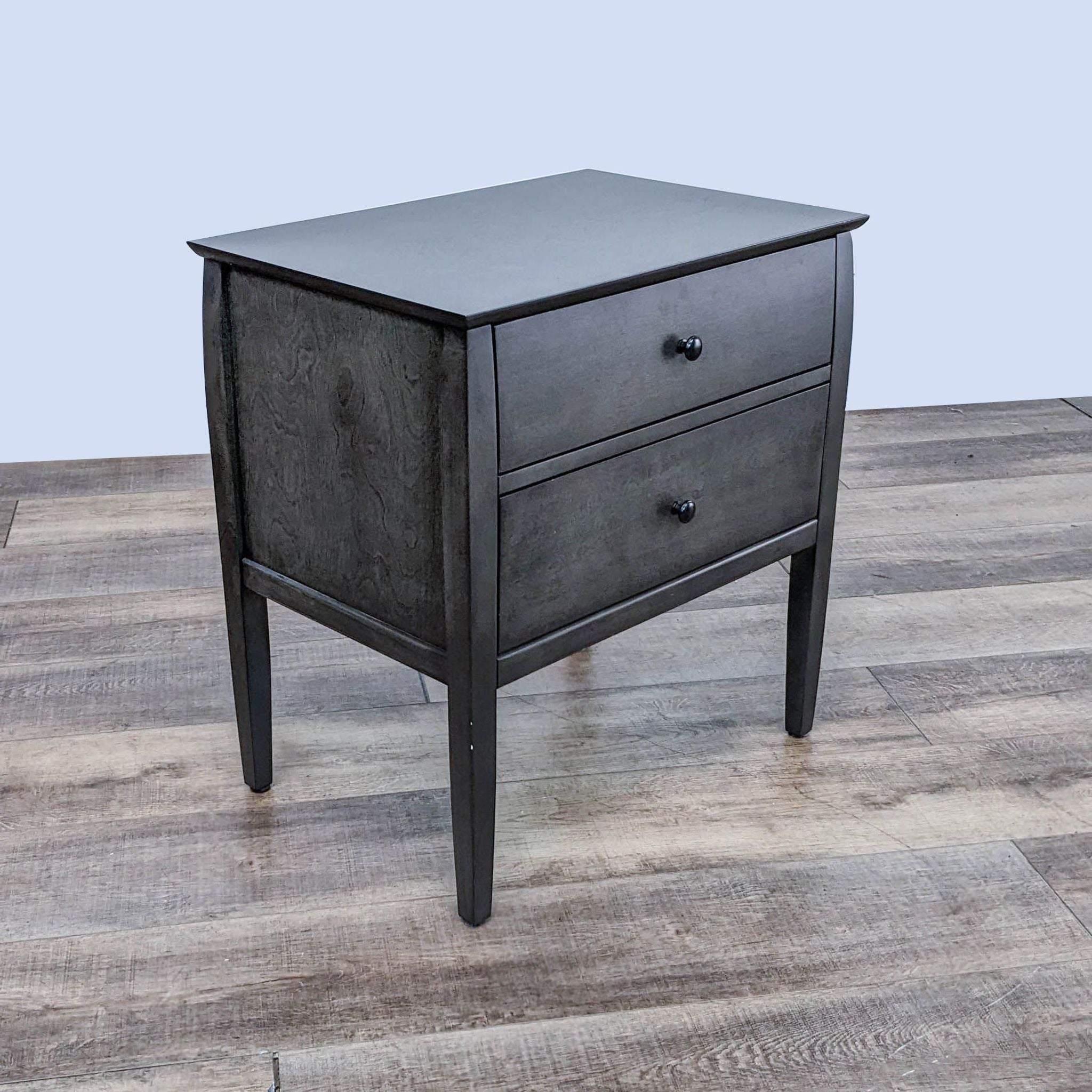 Solid poplar and birch veneer nightstand with two drawers and graphite-finished pulls, designed by Blake Tovin for Crate & Barrel.