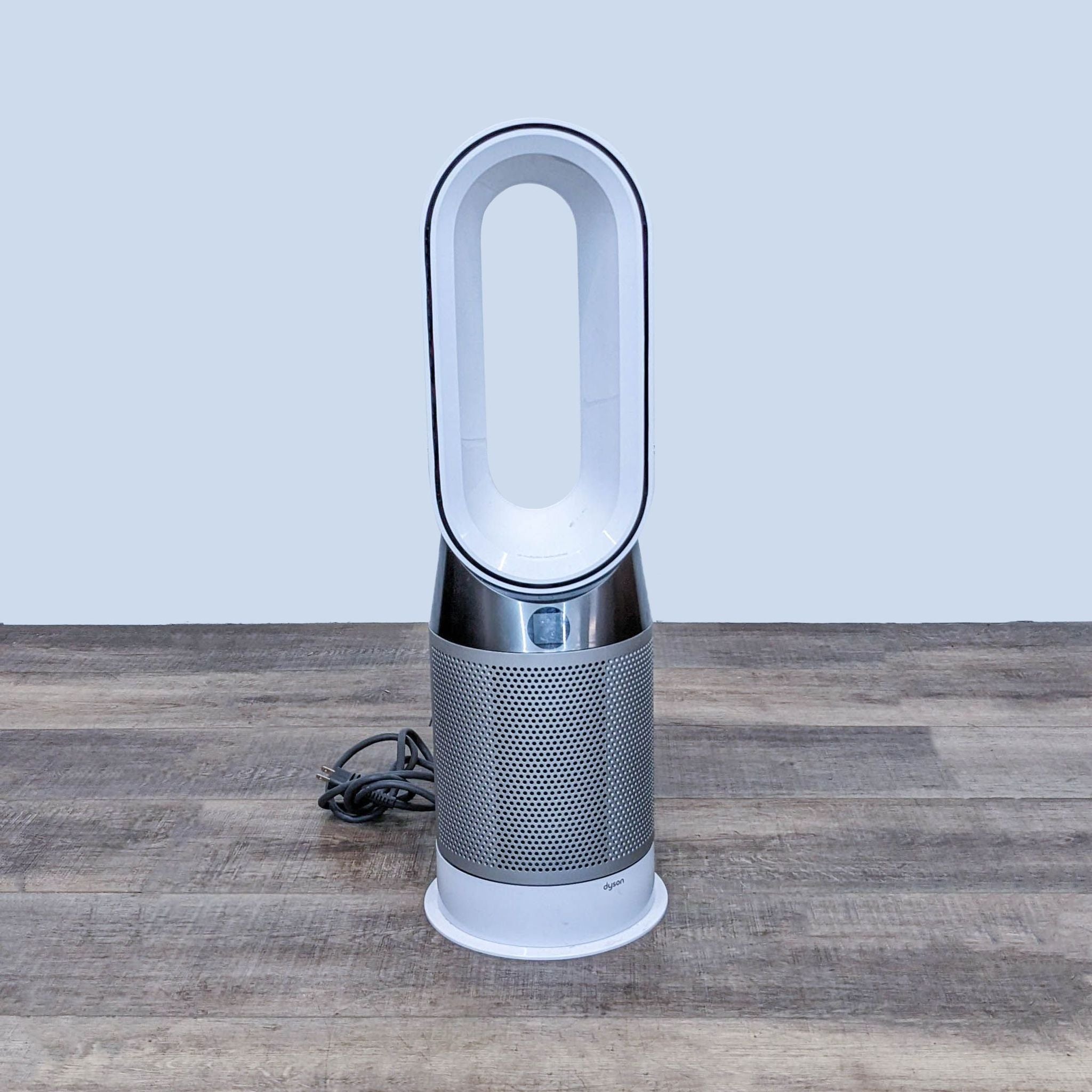 Dyson Purifier Cool Gen1 TP10 HEPA air purifier and fan, capturing ultrafine particles, white and silver design.