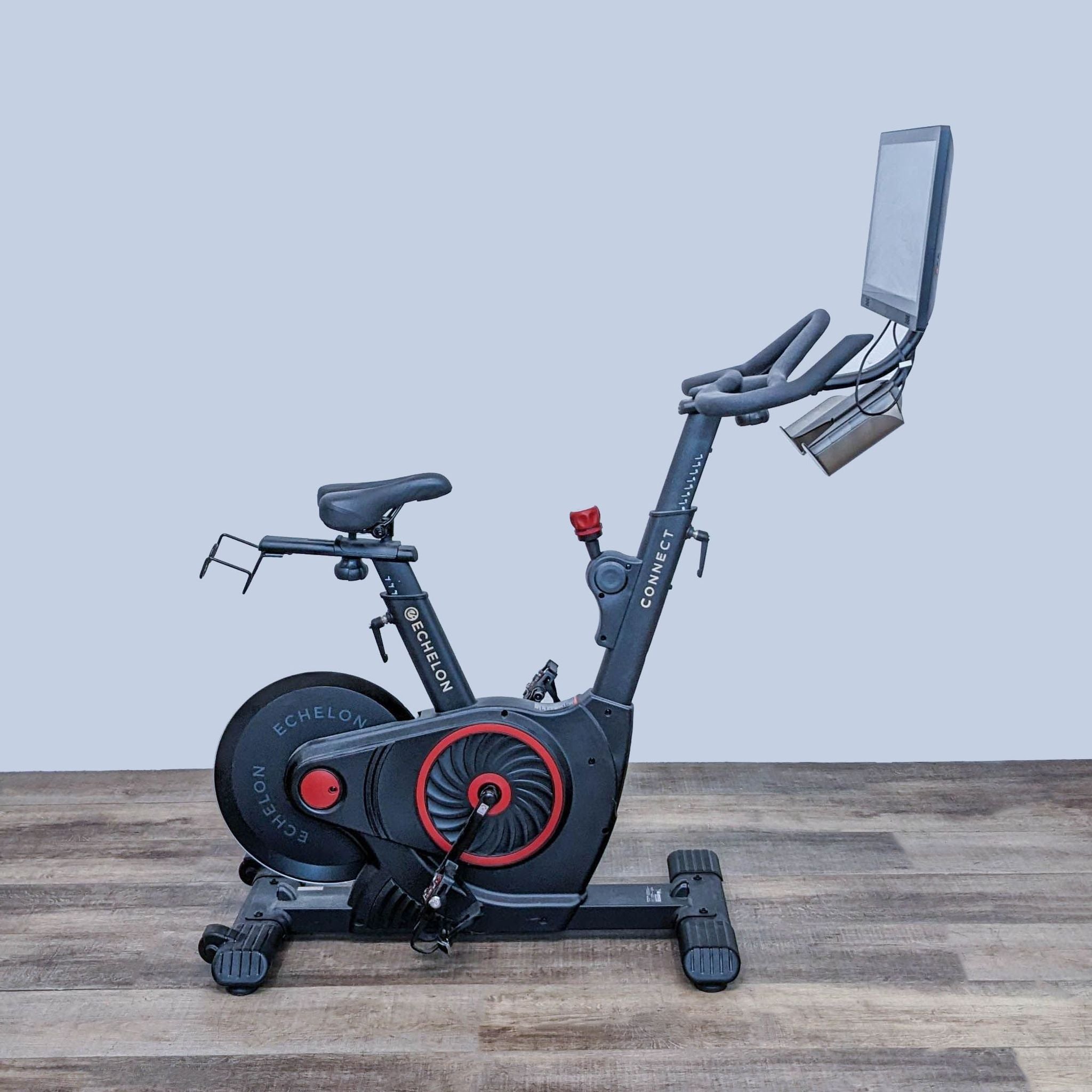 Front-facing view of Echelon's innovative stationary bike with adjustable seating and handlebars, plus a high-definition rotating screen.