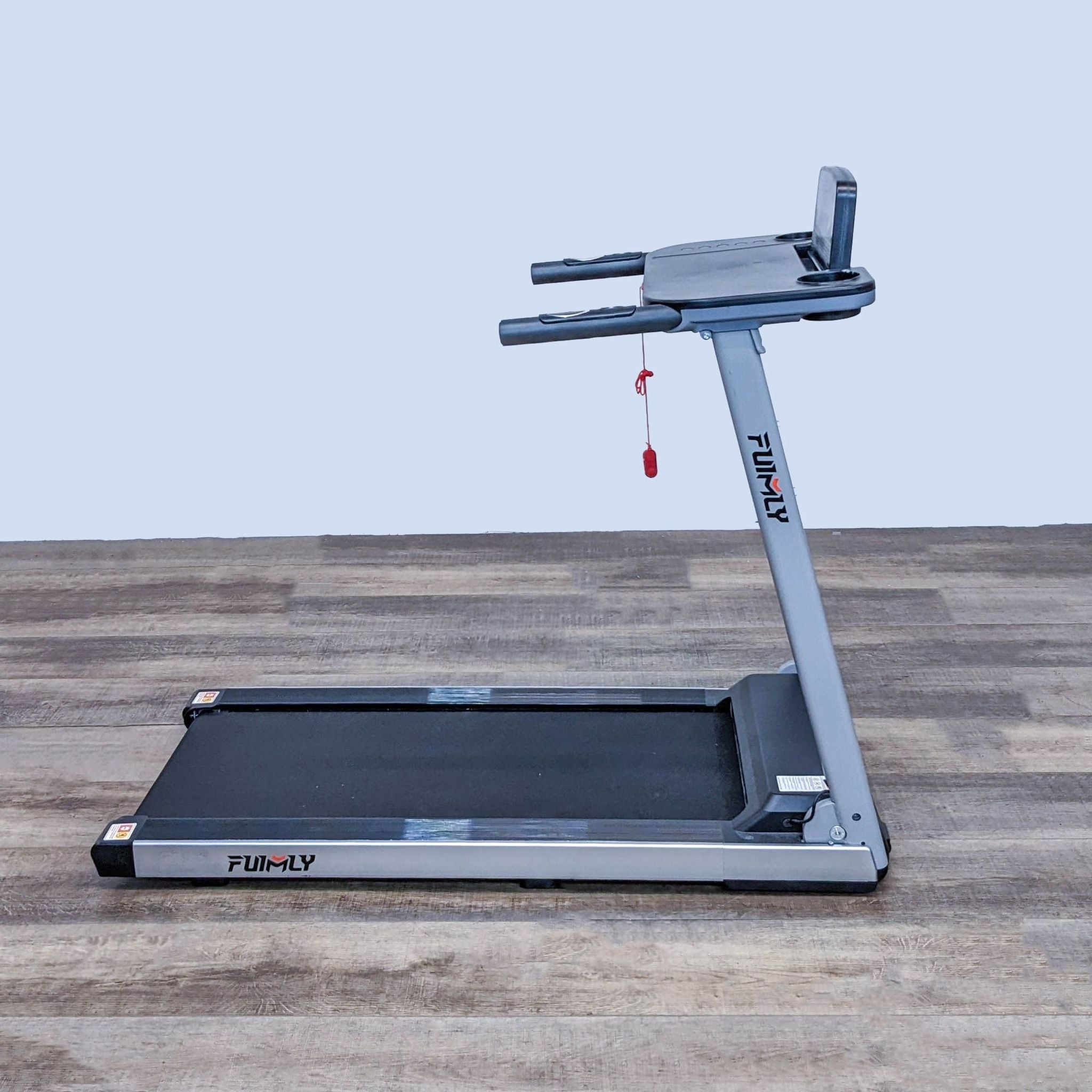Side view of a Funmily branded treadmill showing profile, handrails, and console on a wooden floor background.