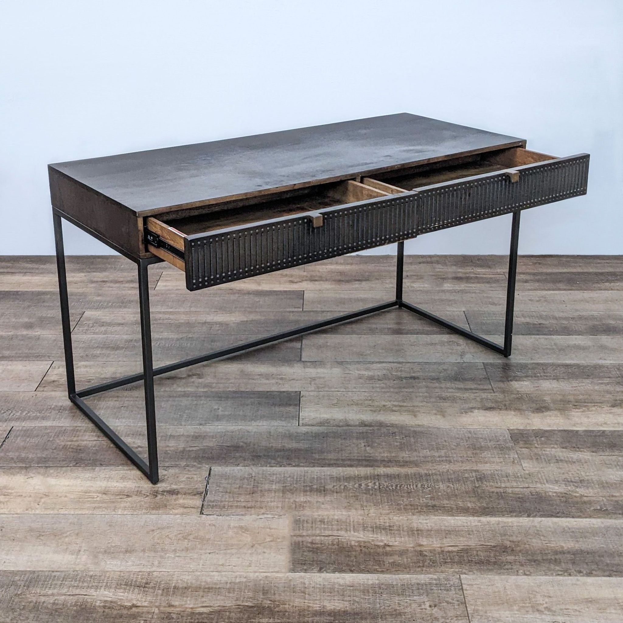 Alt text 2: Open drawer view of Four Hands vintage brown desk, showcasing storage space and linear carvings.