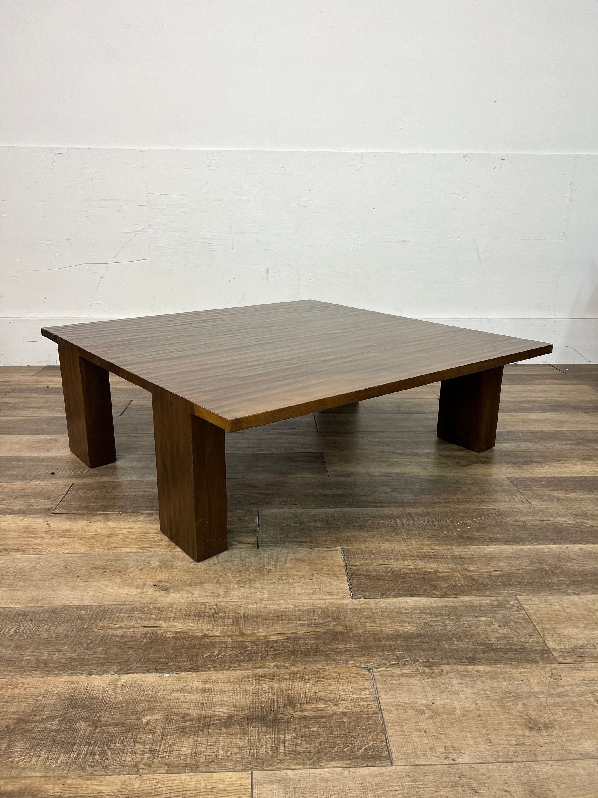 Custom-made walnut coffee table from Kendall Wilkinson Design, viewed at an angle.