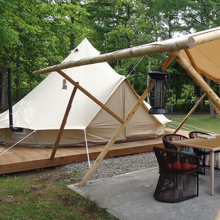 4 person tent on a platform in the trees