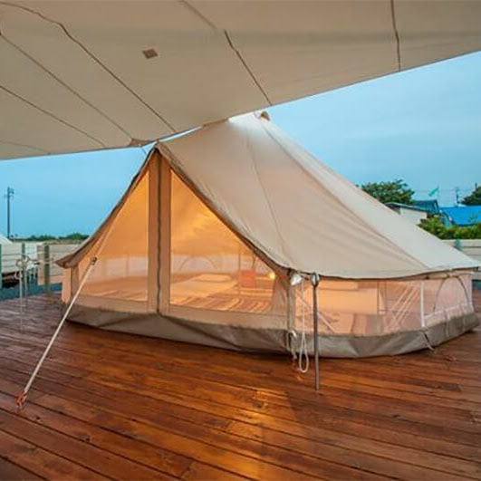 three person tent - CanvasCamp Sibley 450 Protech Canvas Bell Tent Sand set up on a wooden deck