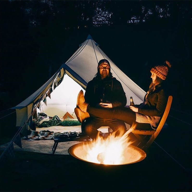 two person tent with campfire in front