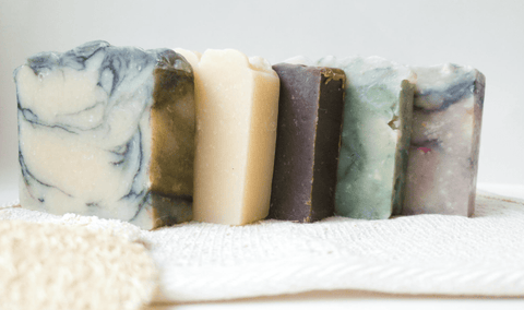 5 multi-colored luxe soap bars lined next together
