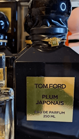 bottle of tom ford's plum japonais perfume