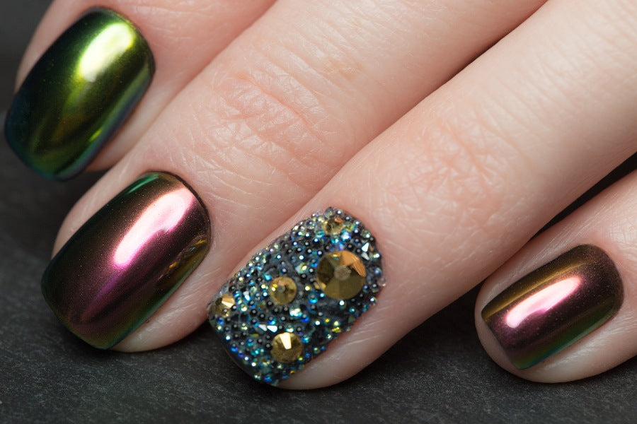 Planet-system charm nail designs orbit colourful worlds, celebrating cosmic exploration