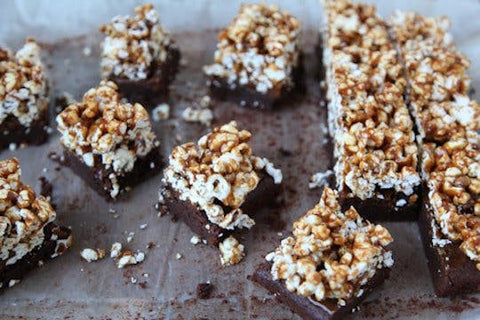 brownies topped with popcorn