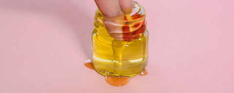 Fingers dipped in honey from Unsplash